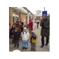 Raising money for the Hunstanton Town Hall basement Youth Project Outside Sainsbury's, Hunstanton &Bryant Marriott directing the impromptu sleigh bell 
		ensemble! 18th December, 2010